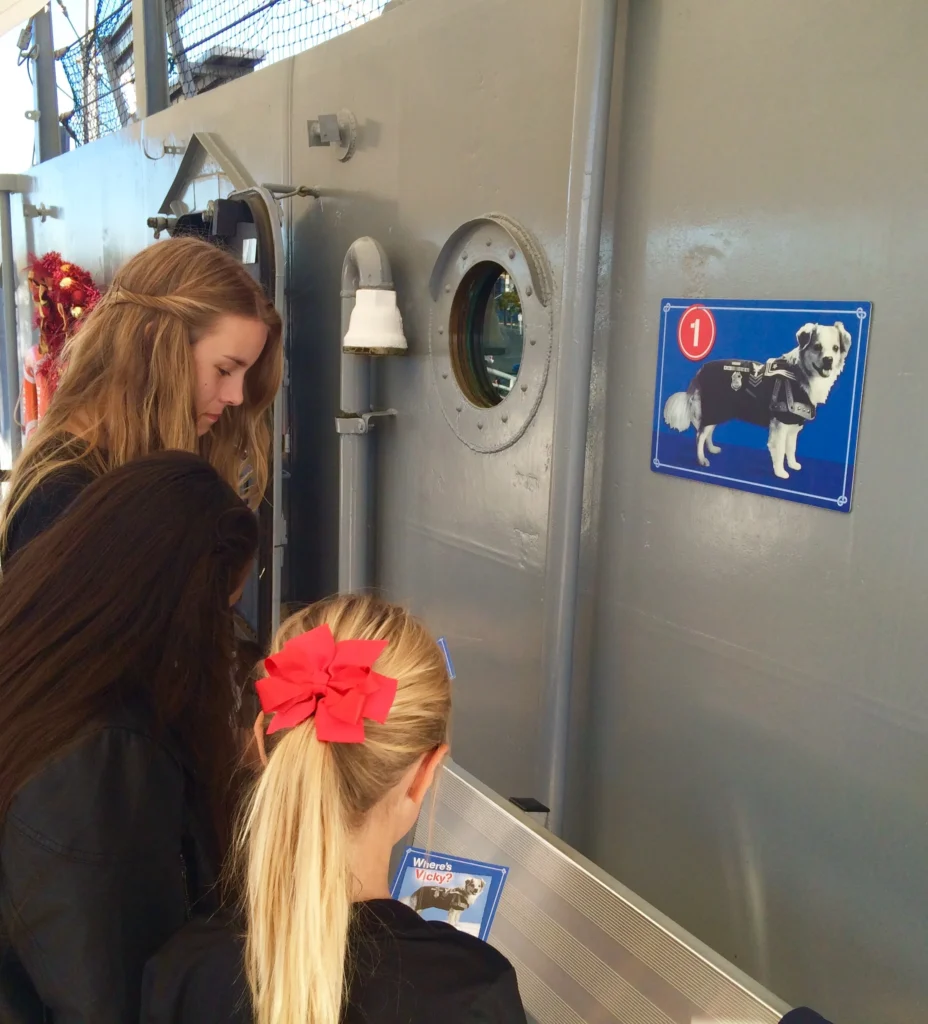 Vicky the dog scavenger hunt aboard Battleship IOWA.